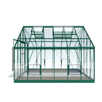 Rhino Greenhouse with a green metal frame and transparent glass panels, featuring automatic roof vents, in a minimalist indoor setting.