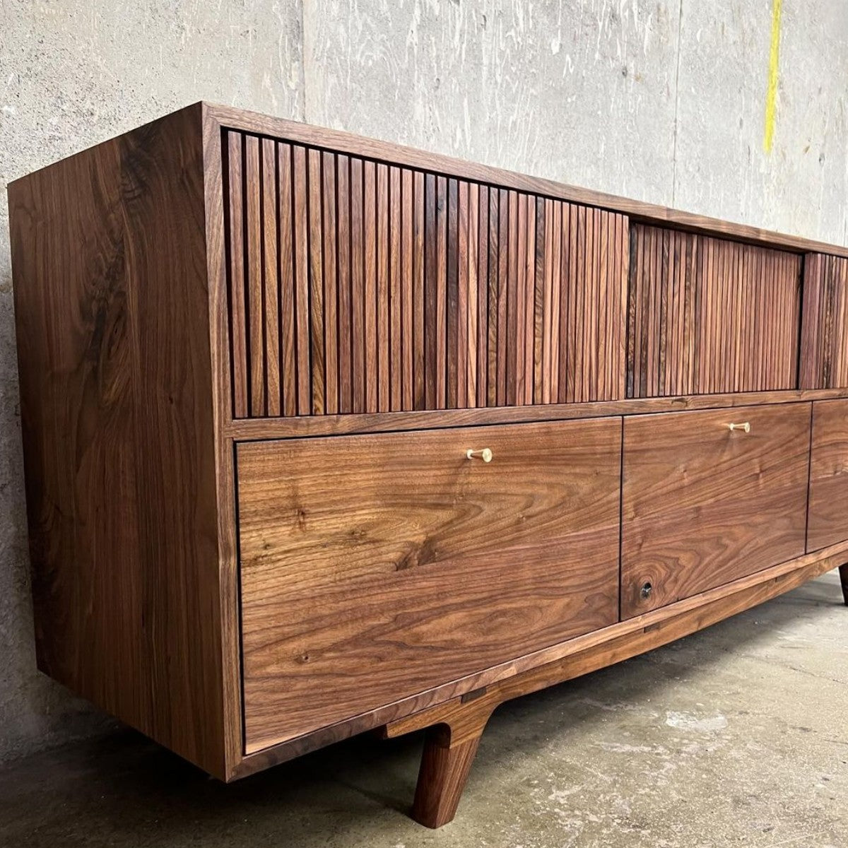 Brevyn Walnut Wood Sideboard side angle view