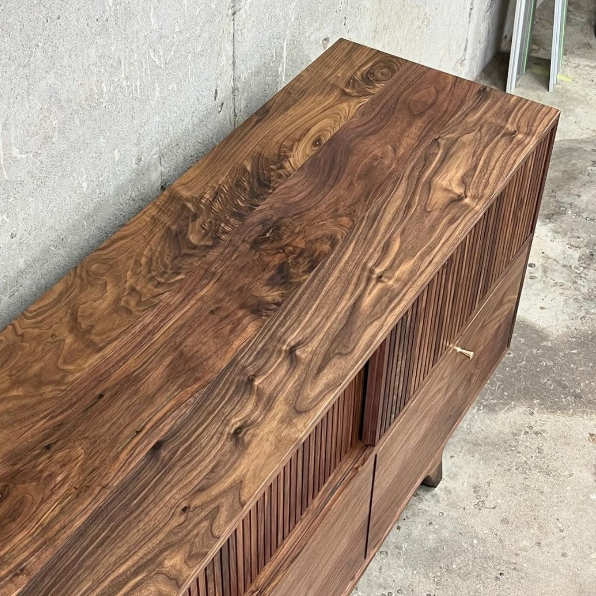 Brevyn Walnut Wood Sideboard 68-inch top surface texture view