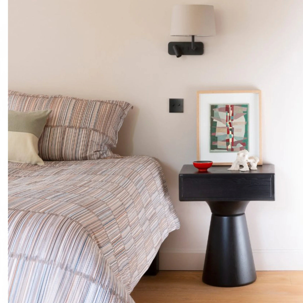 Small bedside table for compact bedroom spaces

