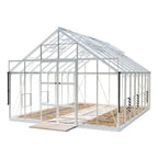 Glass Rhino Greenhouse with a white frame stands empty. The structure has open panels and sliding doors, situated on a stone pathway, with a white background.