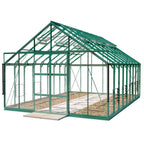 Green Rhino Greenhouse with metal frame and transparent panels stands on a base of gravel and concrete slabs, set in a plain white background.