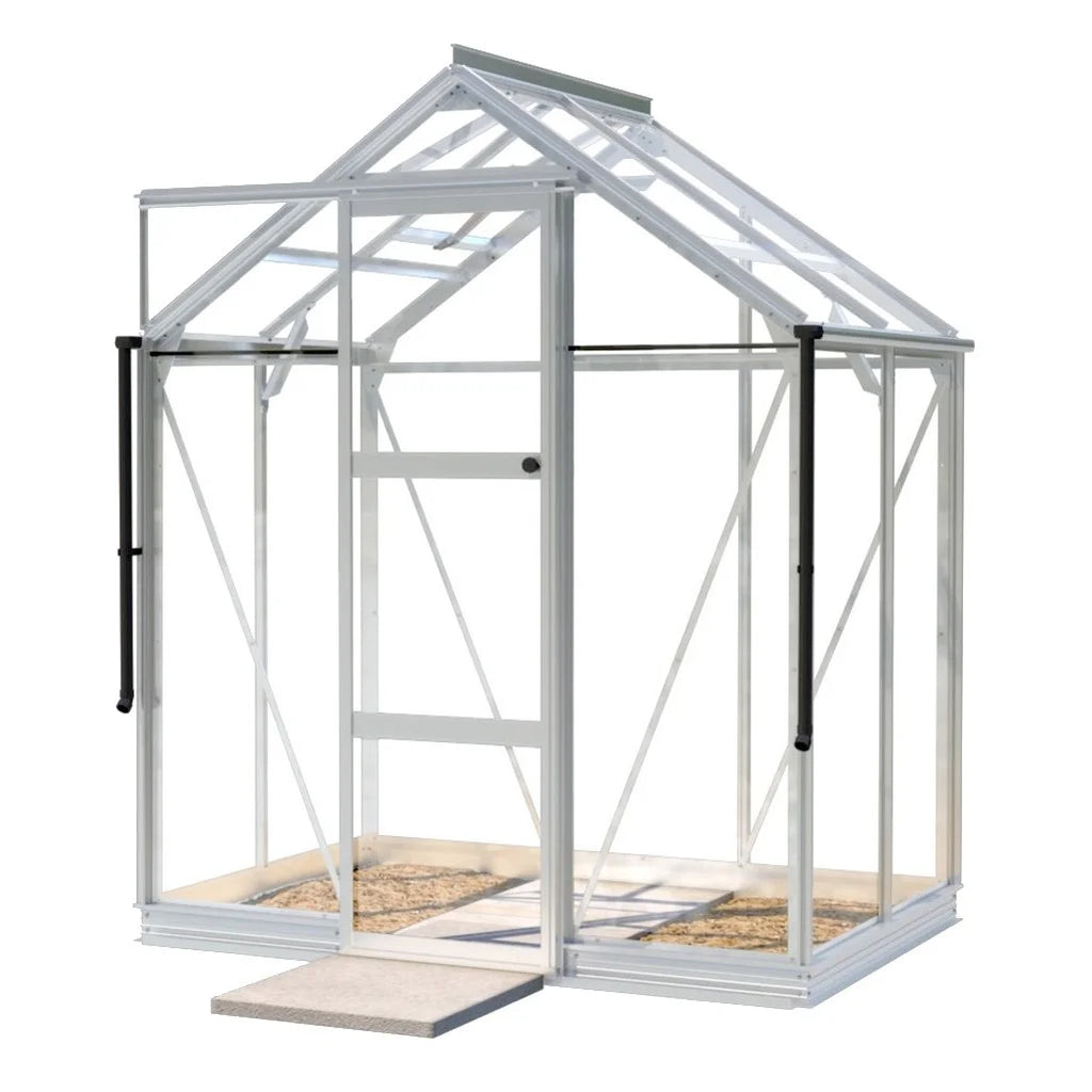 A white-framed glass Rhino Greenhouse stands with an open door, showcasing a paved interior against a plain white background.