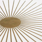 Elegant living room setup with Maren brass starburst coffee table