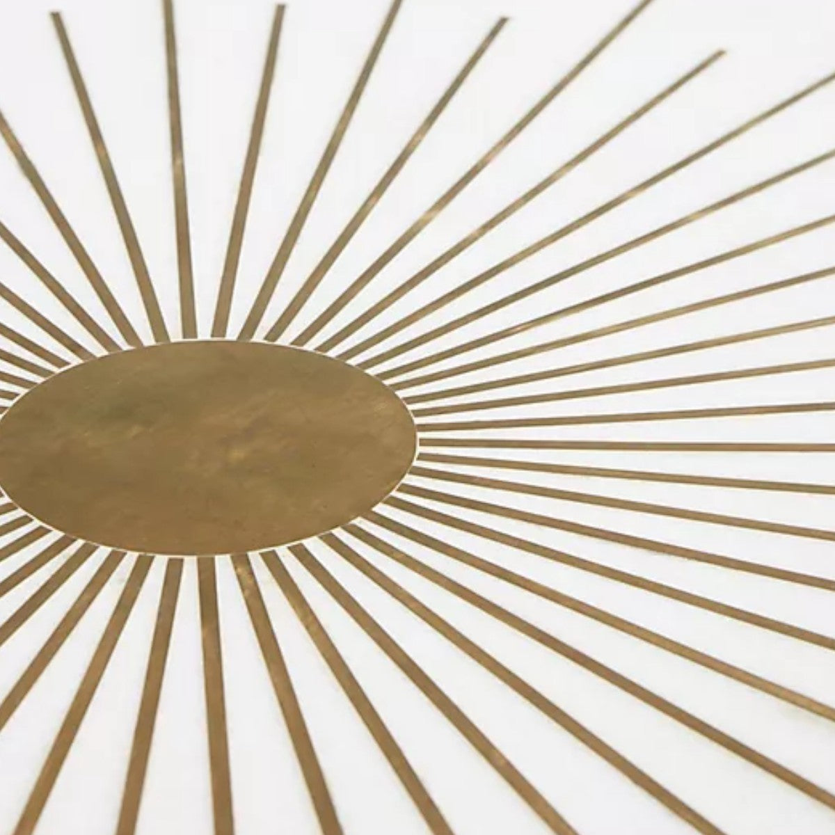 Elegant living room setup with Maren brass starburst coffee table