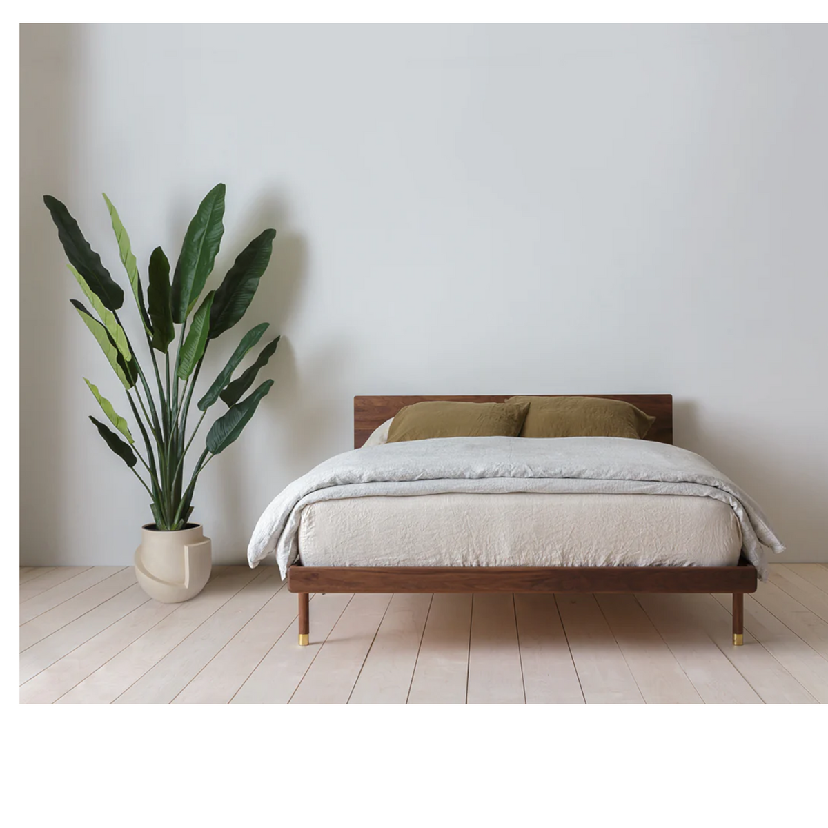 Akos Walnut Wood Bed front view